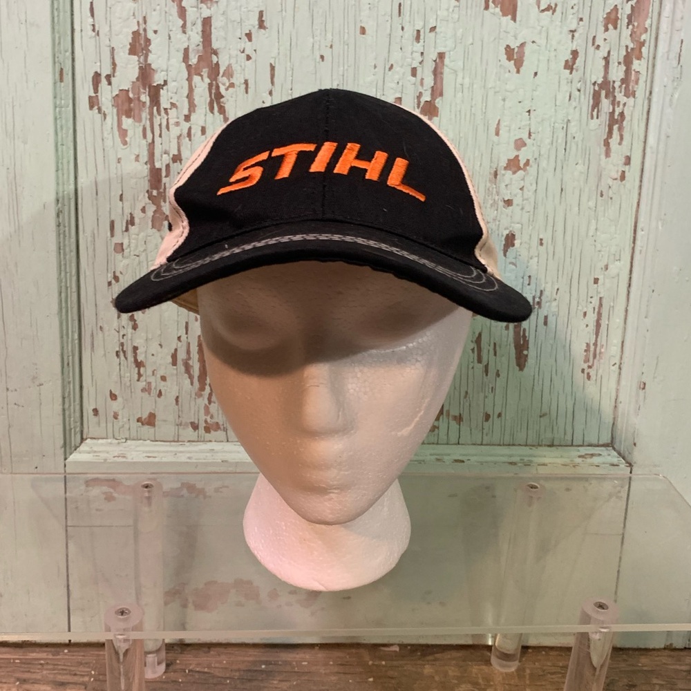 Men’s black and orange Stihl hat